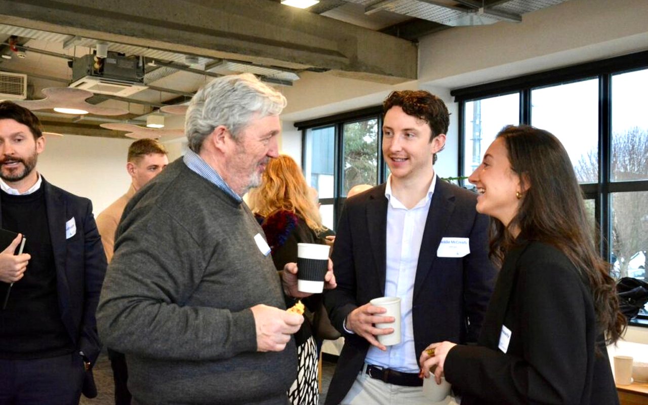 Founders and executives talking at an Agile Executives networking event